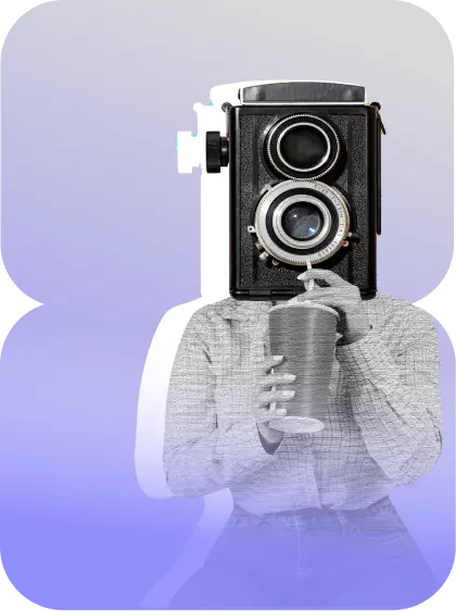Person holding a vintage camera