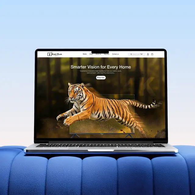 Eye Plus LED TV website shown on a laptop